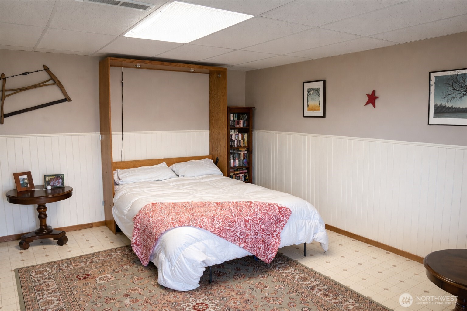 8 Mundinger Lane Omak, WA 98841 - Photo 23 of 37 a bedroom with a bed and wooden floor