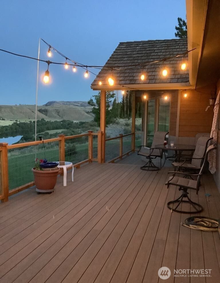 8 Mundinger Lane Omak, WA 98841 - Photo 28 of 37 a view of a terrace with hardwood floor