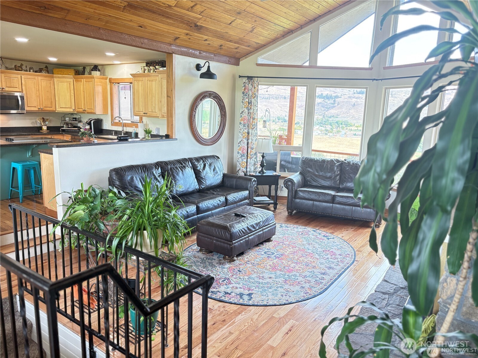 8 Mundinger Lane Omak, WA 98841 - Photo 4 of 37 a living room with furniture and a floor to ceiling window
