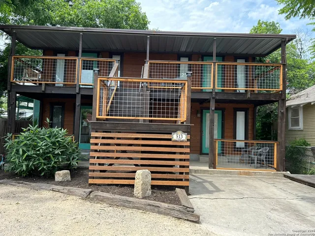 a front view of a house with a porch