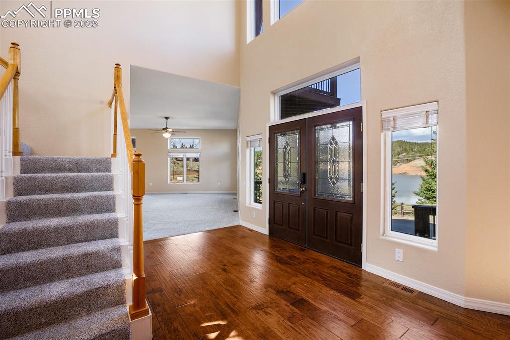 1427 Spring Valley Drive Divide, CO 80814 - Photo 16 of 50 a view of an entryway with wooden floor and door