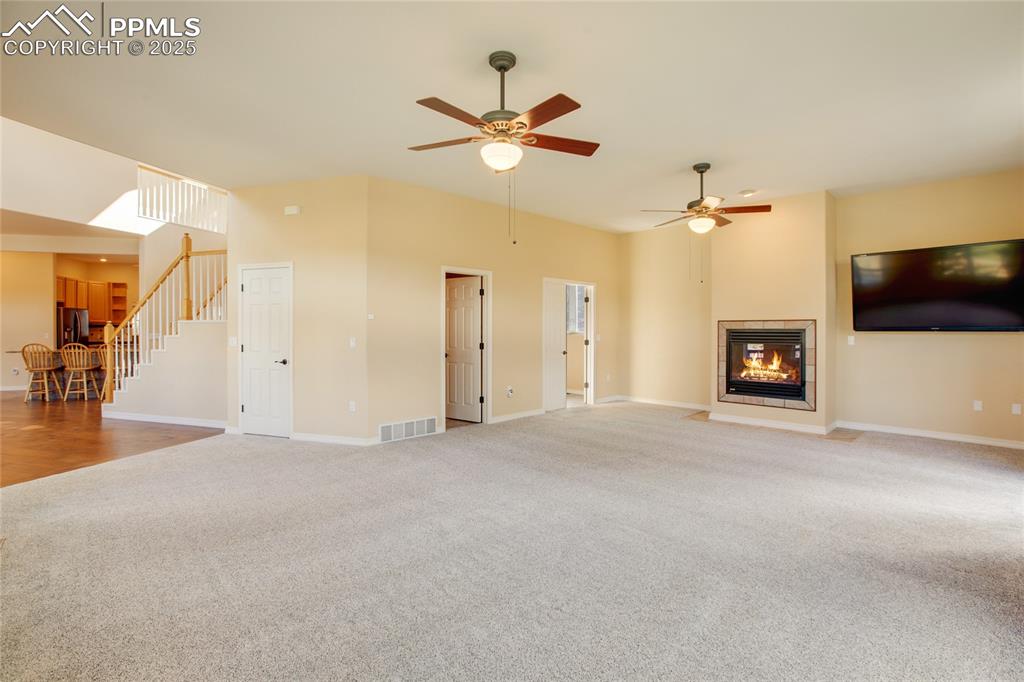 1427 Spring Valley Drive Divide, CO 80814 - Photo 18 of 50 a view of a livingroom with a ceiling fan and a window