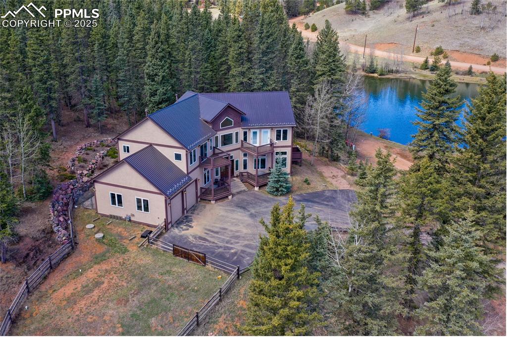 1427 Spring Valley Drive Divide, CO 80814 - Photo 2 of 50 an aerial view of a house