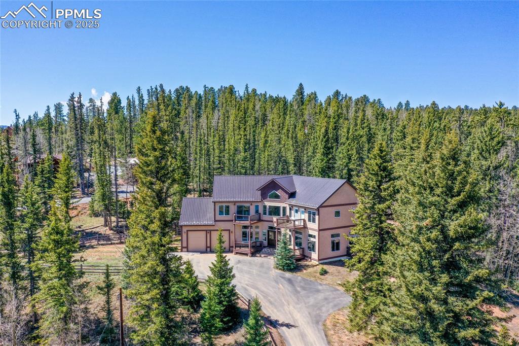 1427 Spring Valley Drive Divide, CO 80814 - Photo 3 of 50 an aerial view of a house