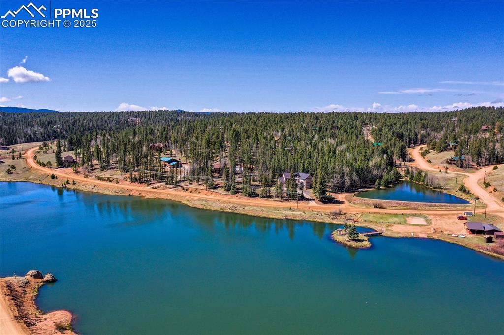 1427 Spring Valley Drive Divide, CO 80814 - Photo 47 of 50 a view of a swimming pool with an ocean view