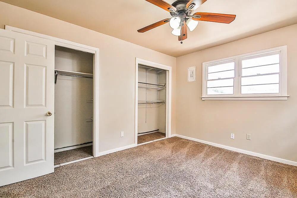 2714 40th Street Lubbock, TX 79413 - Photo 11 of 14 a view of an empty room with a window