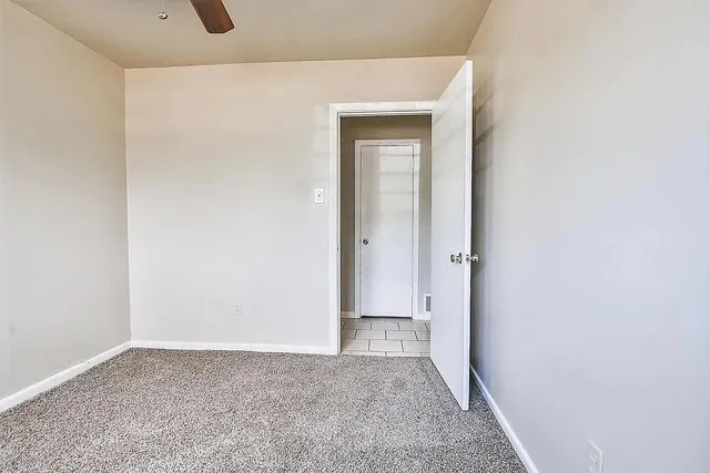 a view of hallway with closet
