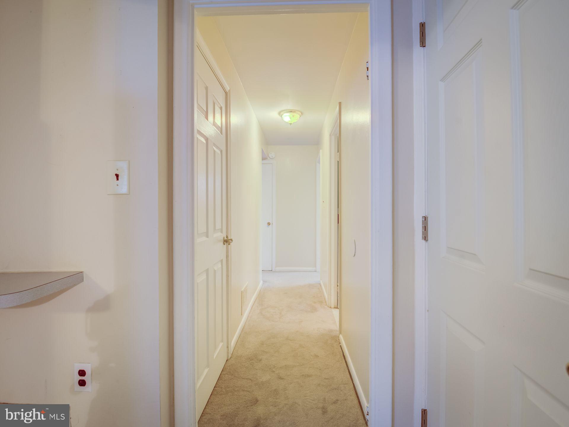 16111 Laurel Ridge Drive Laurel, MD 20707 - Photo 47 of 61 LOWER LEVEL HALL WAY