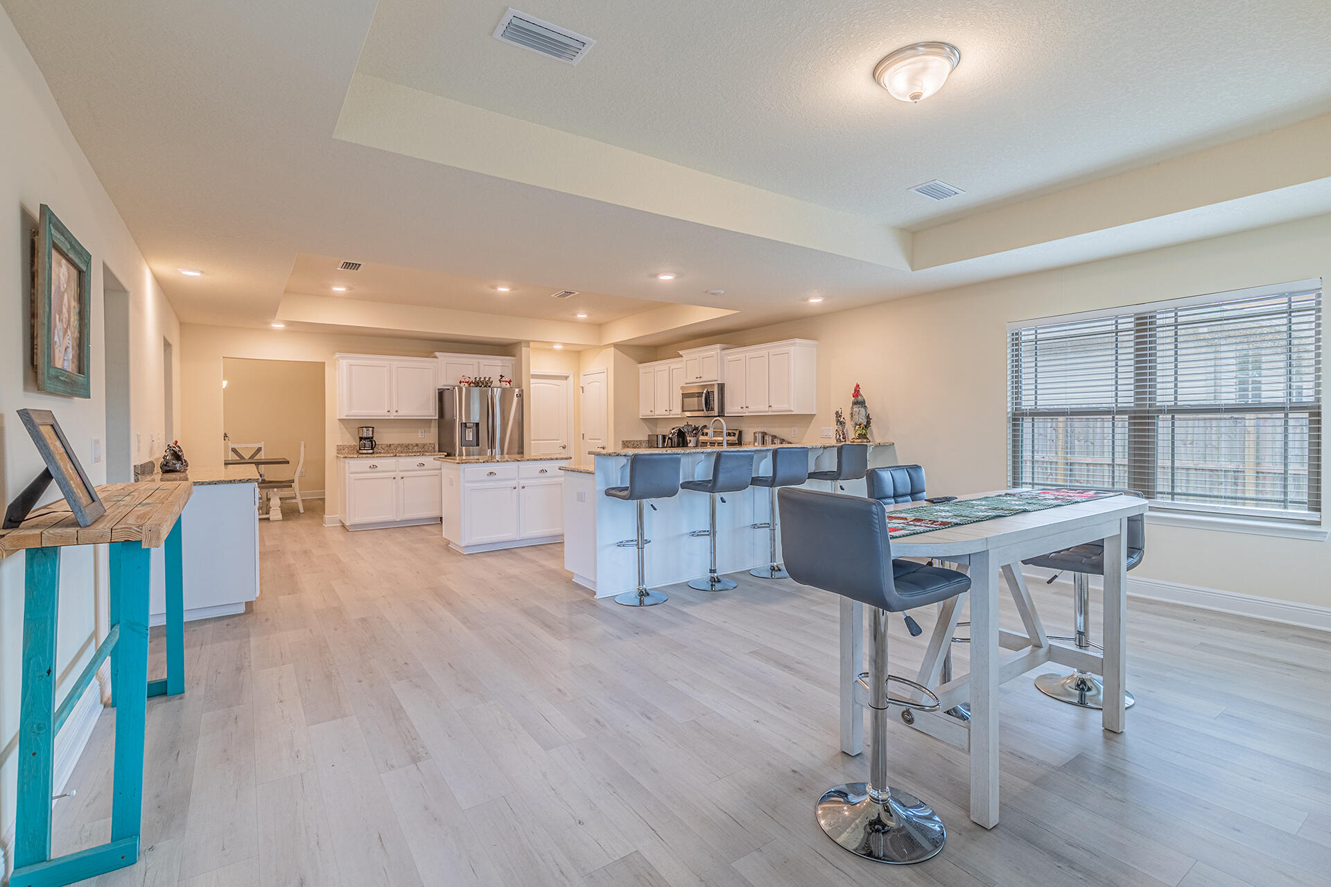 3639 Ranch Drive Crestview, FL 32539 - Photo 12 of 40 a large kitchen with a table and chairs in it