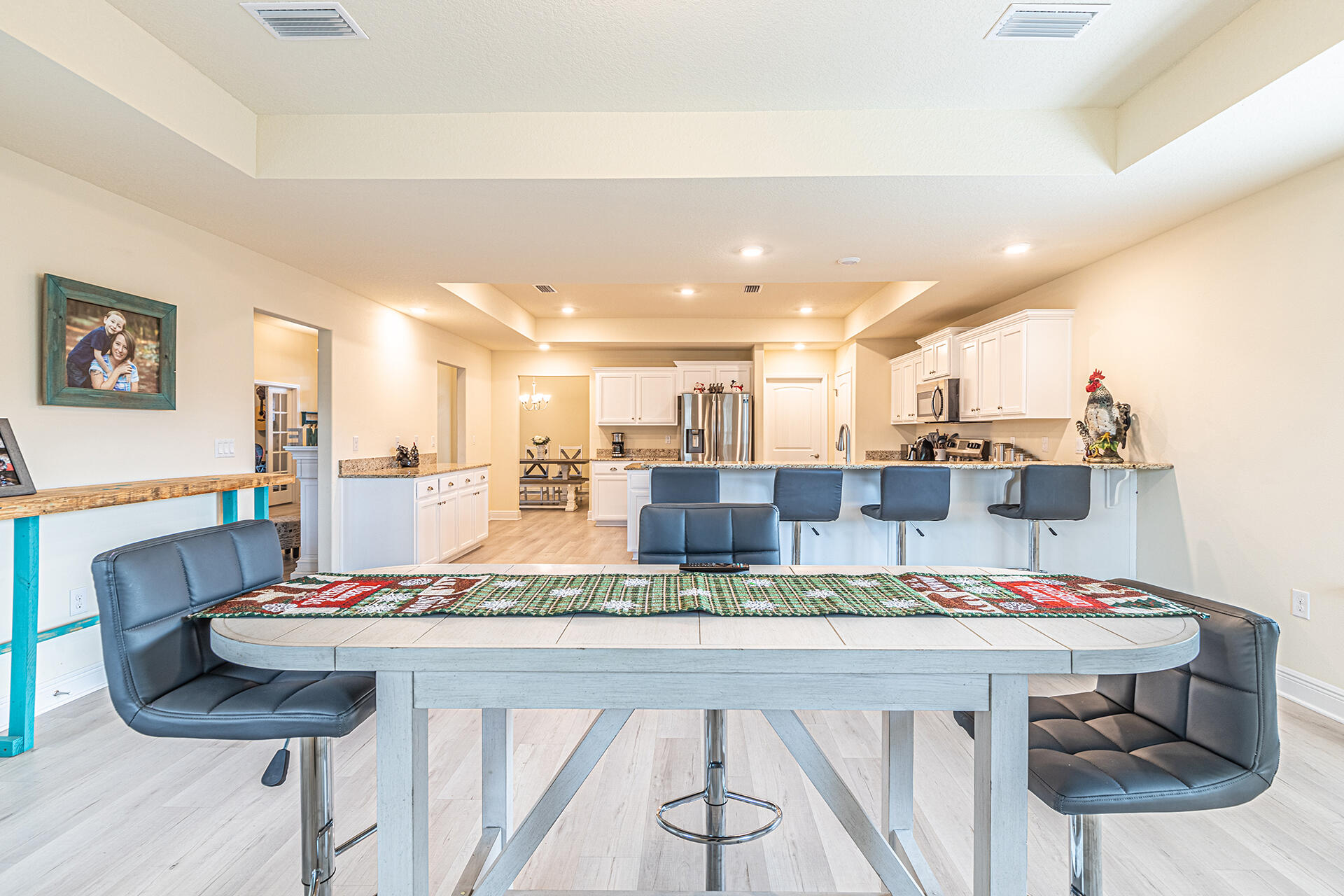 3639 Ranch Drive Crestview, FL 32539 - Photo 13 of 40 a kitchen with a table and chairs