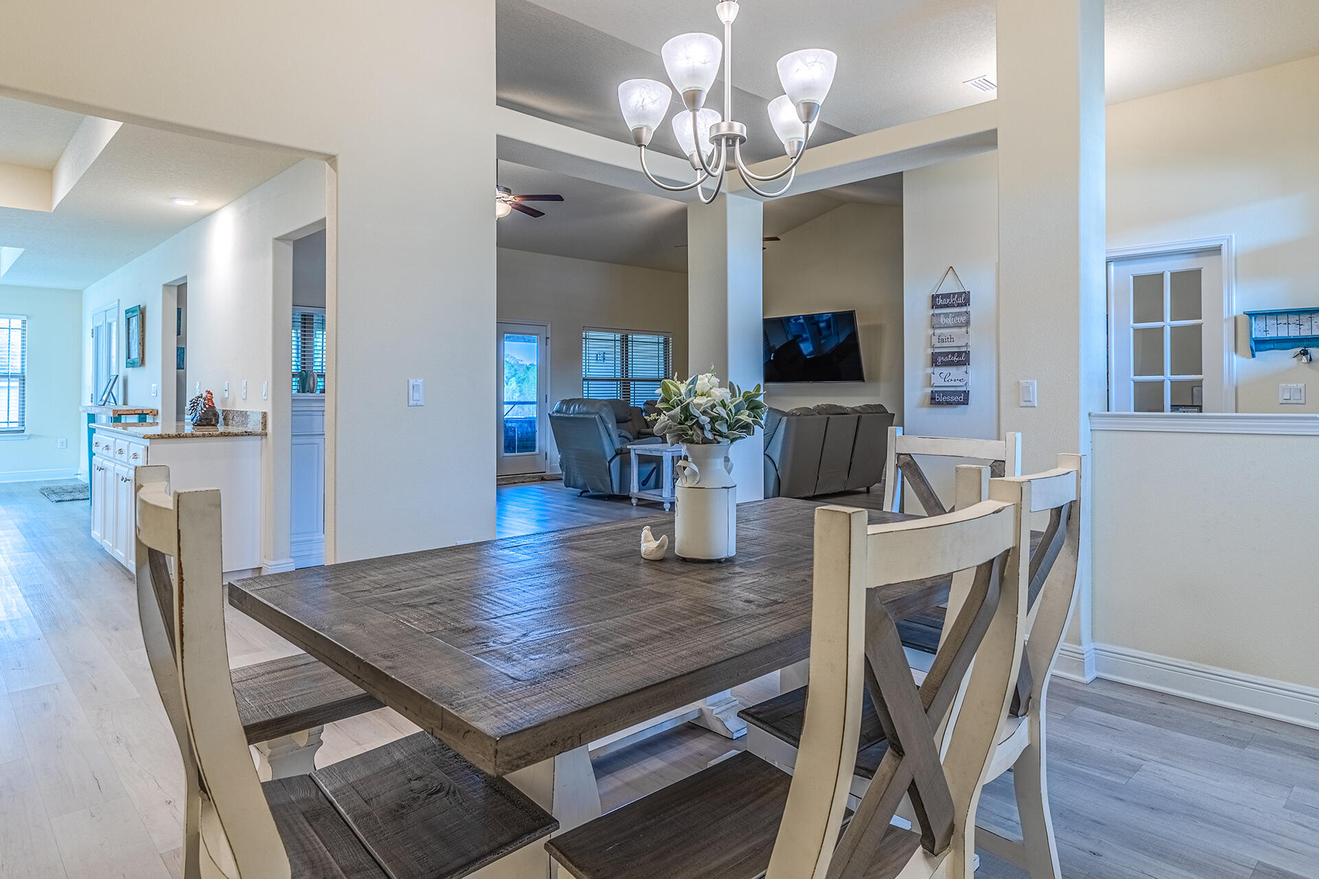 3639 Ranch Drive Crestview, FL 32539 - Photo 19 of 40 a view of a dining room with furniture and wooden floor