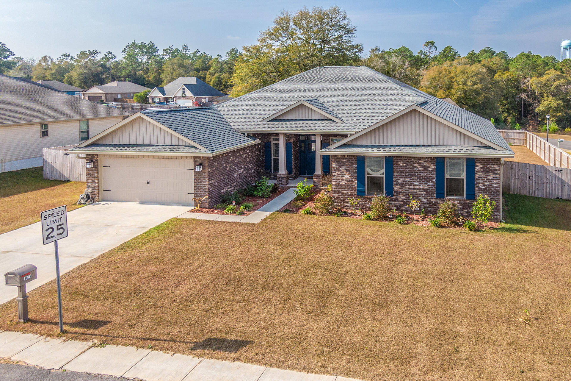 3639 Ranch Drive Crestview, FL 32539 - Photo 2 of 40 a front view of a house with garden