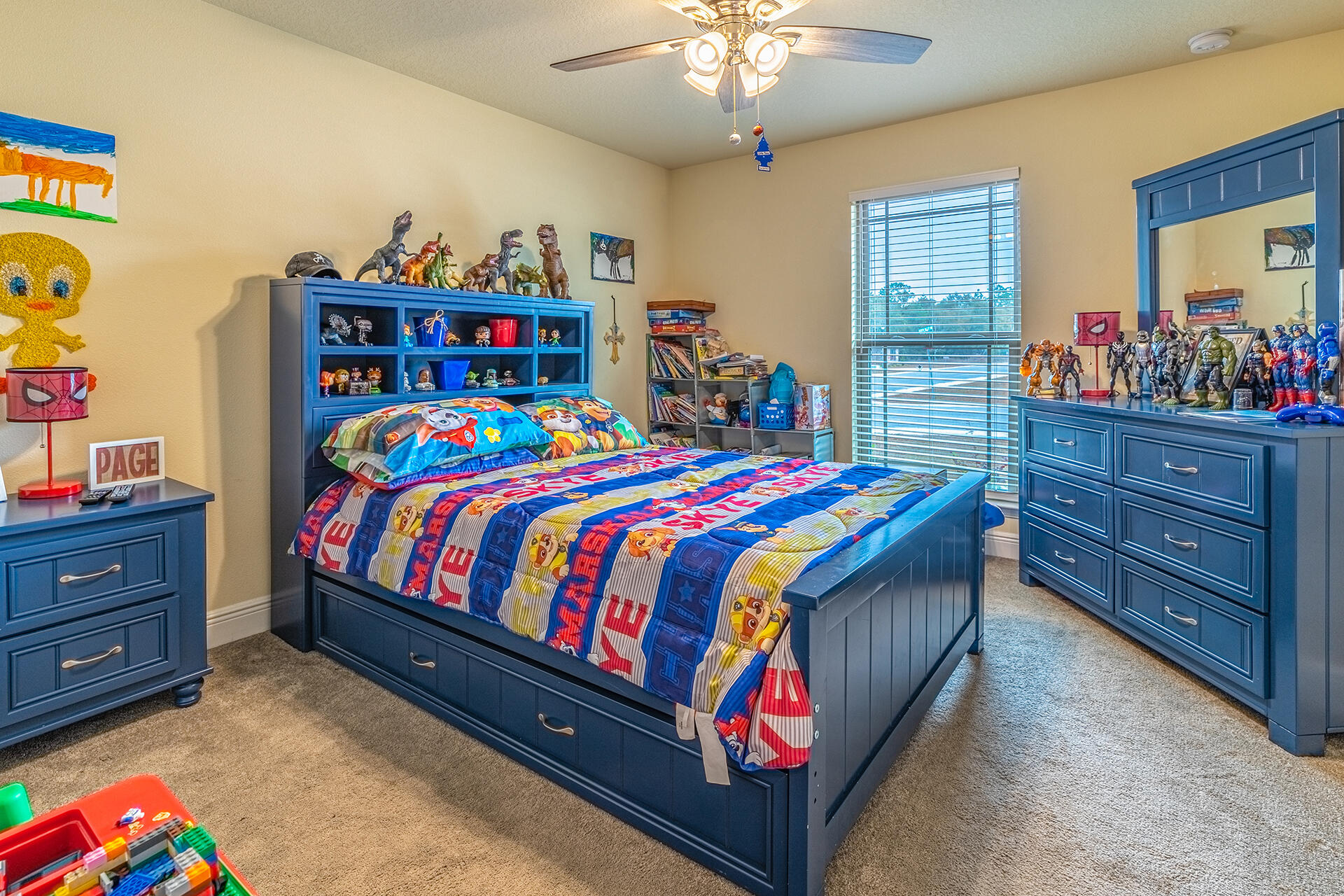3639 Ranch Drive Crestview, FL 32539 - Photo 27 of 40 a bedroom with a bed and a dresser in it