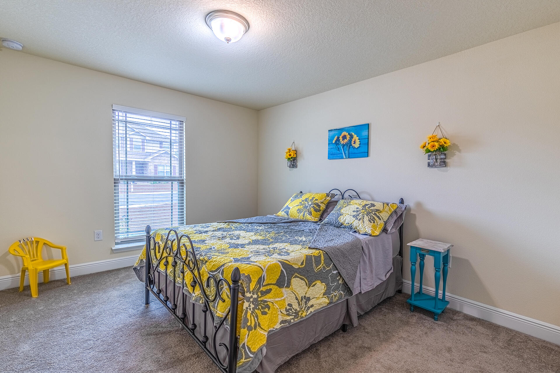 3639 Ranch Drive Crestview, FL 32539 - Photo 29 of 40 a bed sitting in a bedroom next to a window