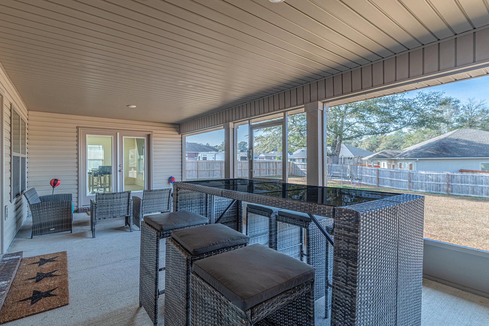 3639 Ranch Drive Crestview, FL 32539 - Photo 32 of 40 a dining room with furniture and wooden floor