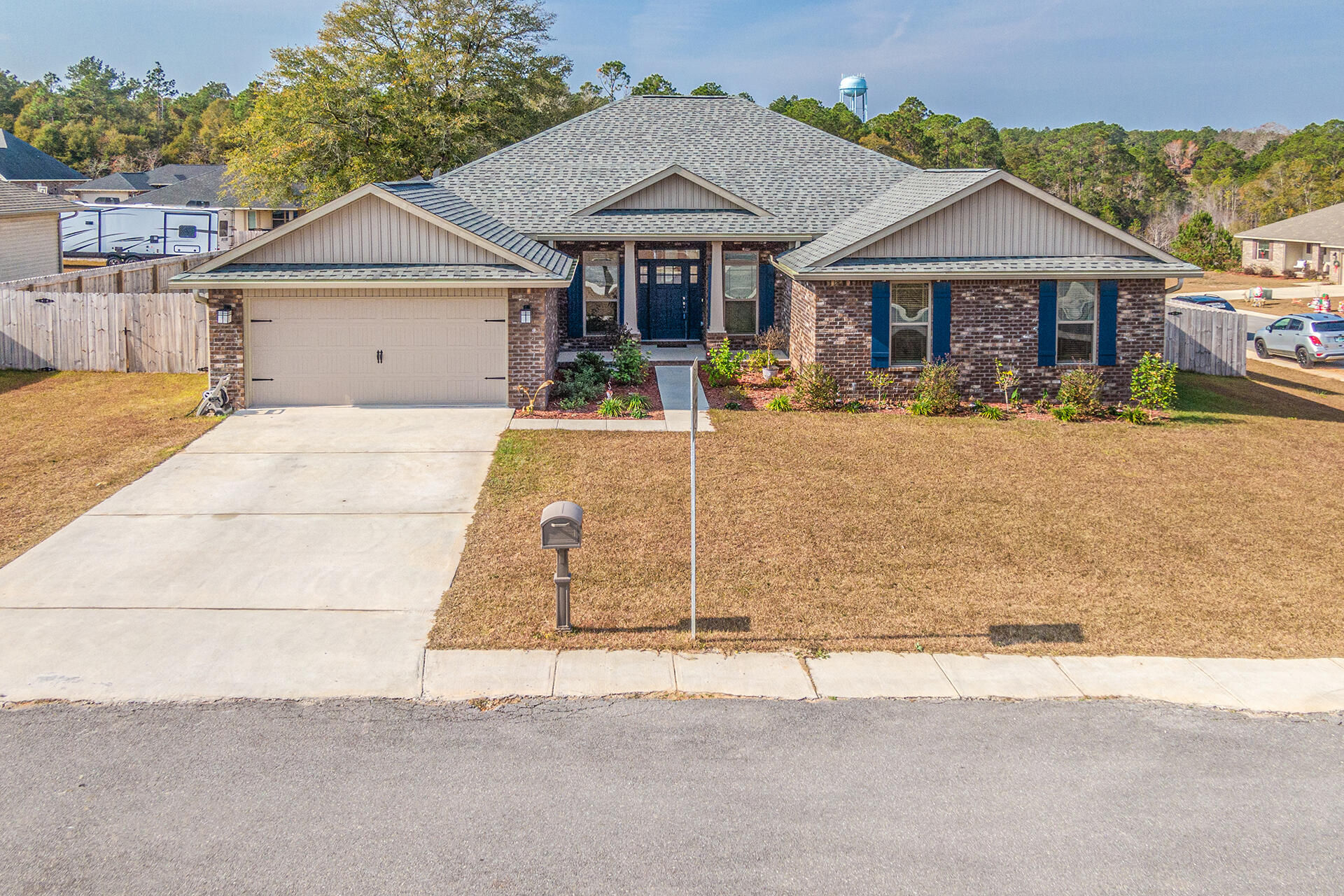 3639 Ranch Drive Crestview, FL 32539 - Photo 39 of 40 a front view of a house with yard porch and seating space