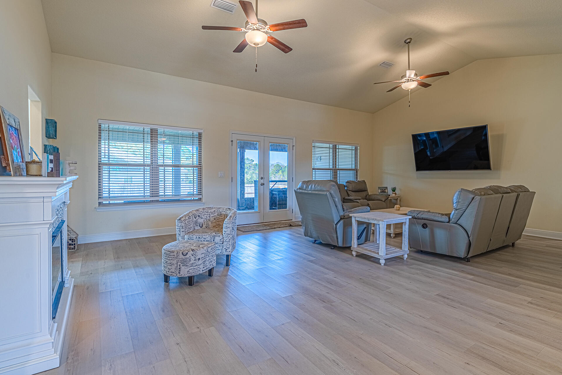 3639 Ranch Drive Crestview, FL 32539 - Photo 10 of 40 a living room with furniture and a flat screen tv