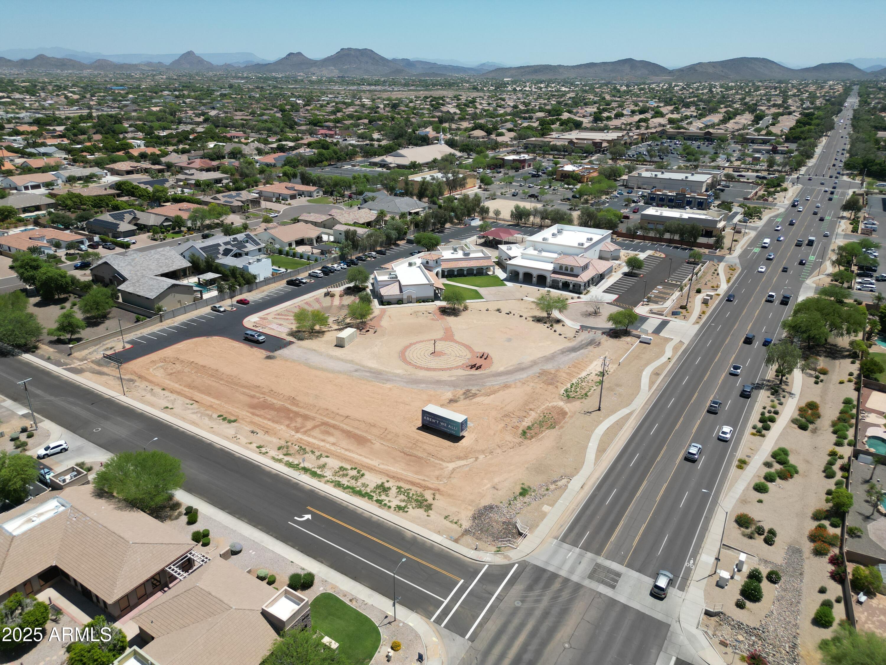 84-xx West Deer Valley Road Peoria, AZ 85383 - Photo 6 of 7 an aerial view of a residential apartment building with a yard