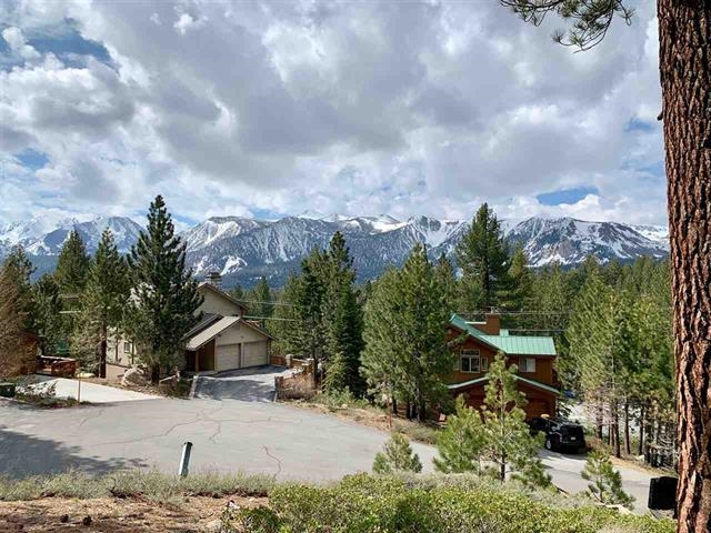 153 Holiday Way Mammoth Lakes, CA 93546 - Photo 15 of 15 a view of a house with a yard and large trees