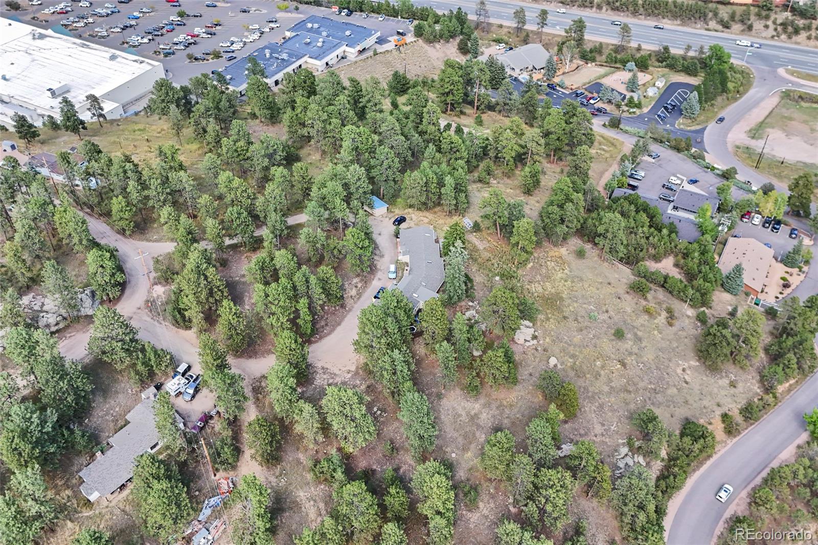 3942 Palo Verde Road Evergreen, CO 80439 - Photo 39 of 41 an aerial view of residential houses with outdoor space