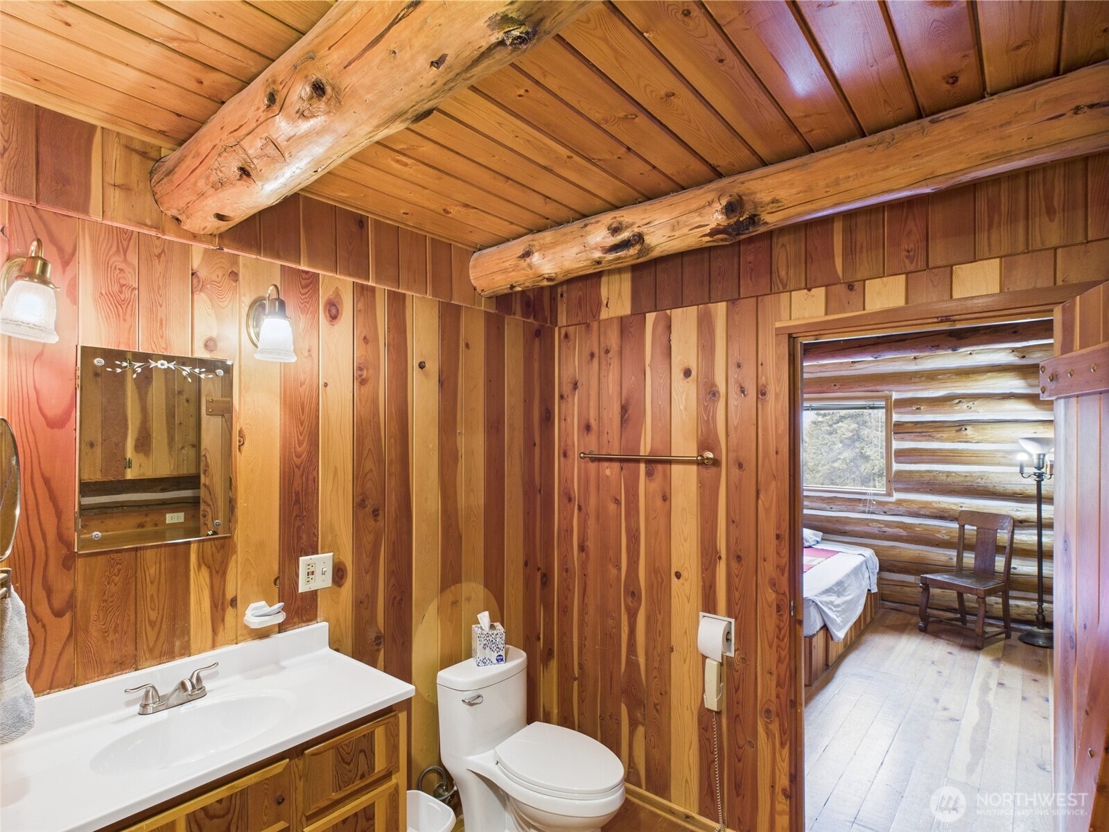 98 Tall Timber Lane Republic, WA 99166 - Photo 18 of 30 a bathroom with a sink toilet and shower