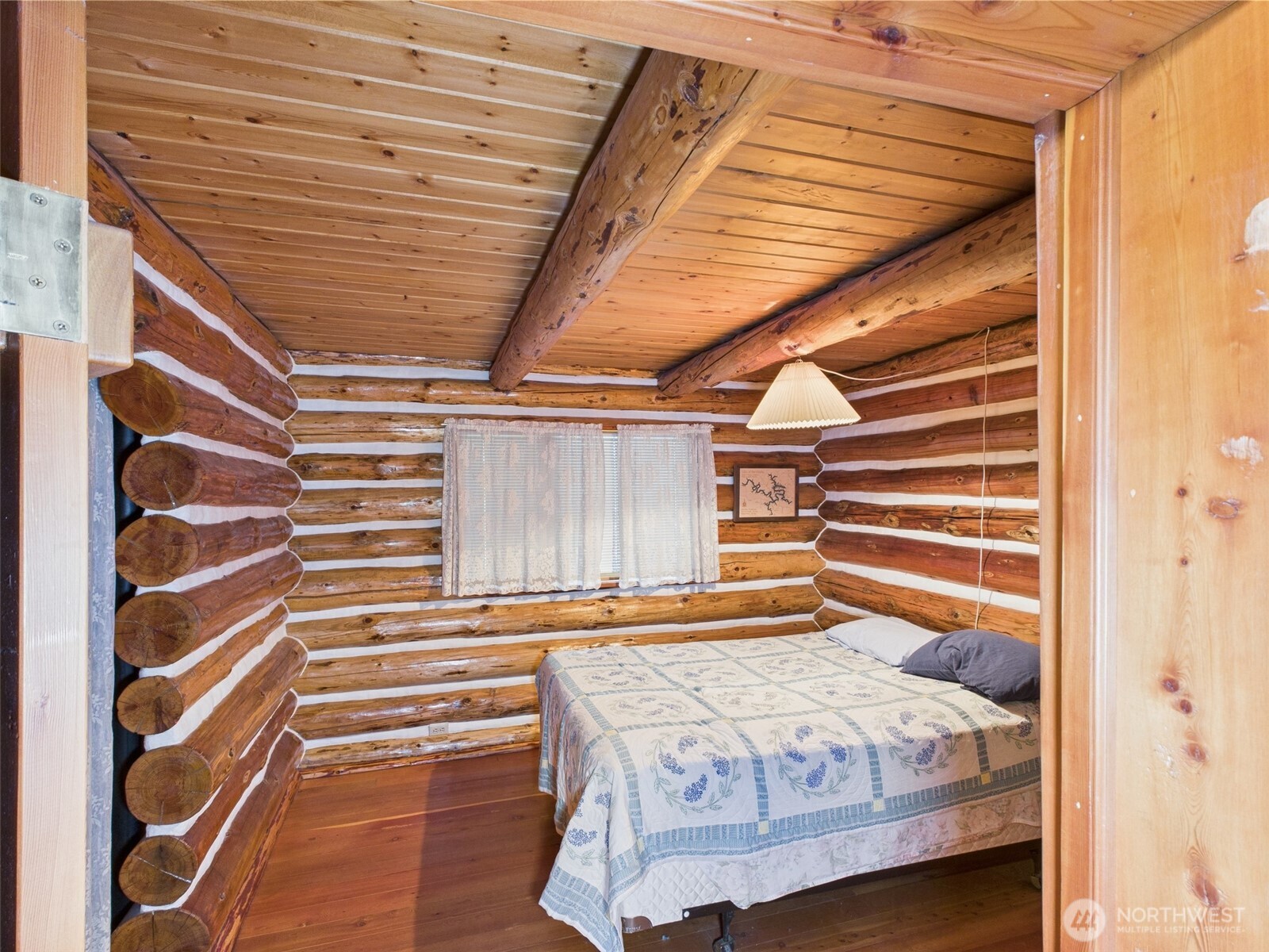 98 Tall Timber Lane Republic, WA 99166 - Photo 19 of 30 a bedroom with a bed and a walk in closet