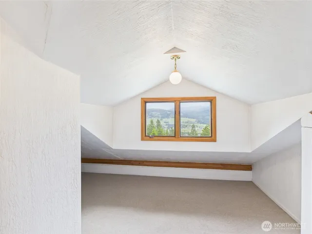 a room with furniture and a window