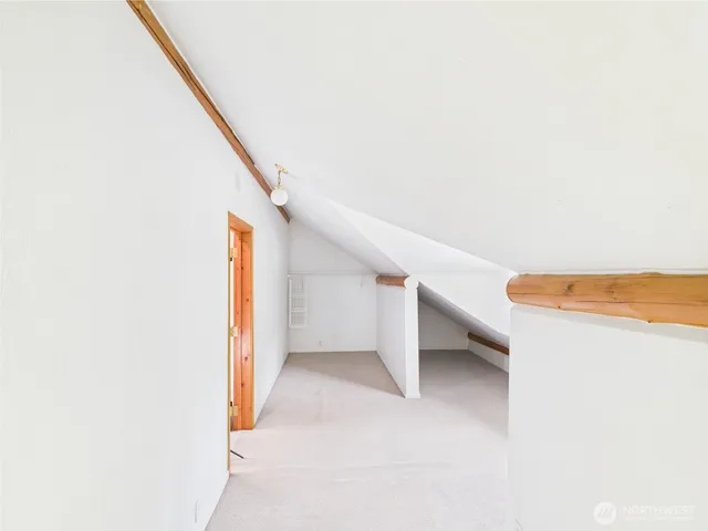 a view of a kitchen with a sink and dishwasher next to a yard