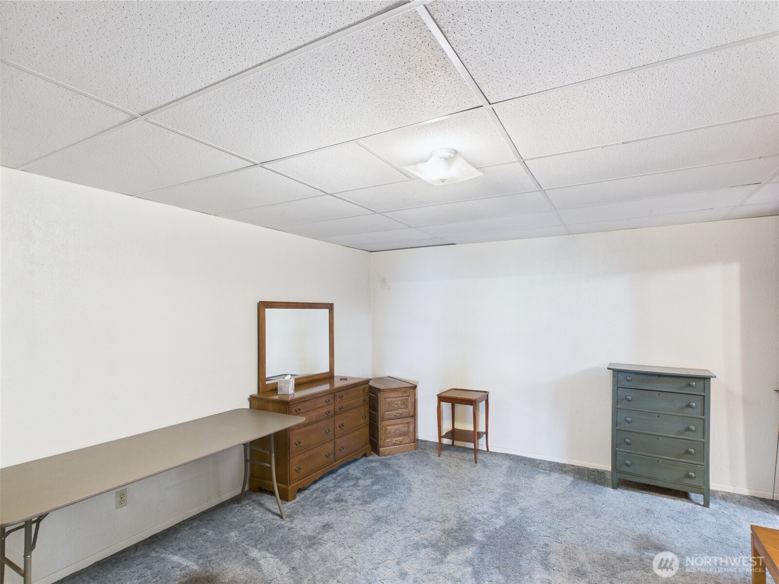 98 Tall Timber Lane Republic, WA 99166 - Photo 26 of 30 a room with furniture and a window