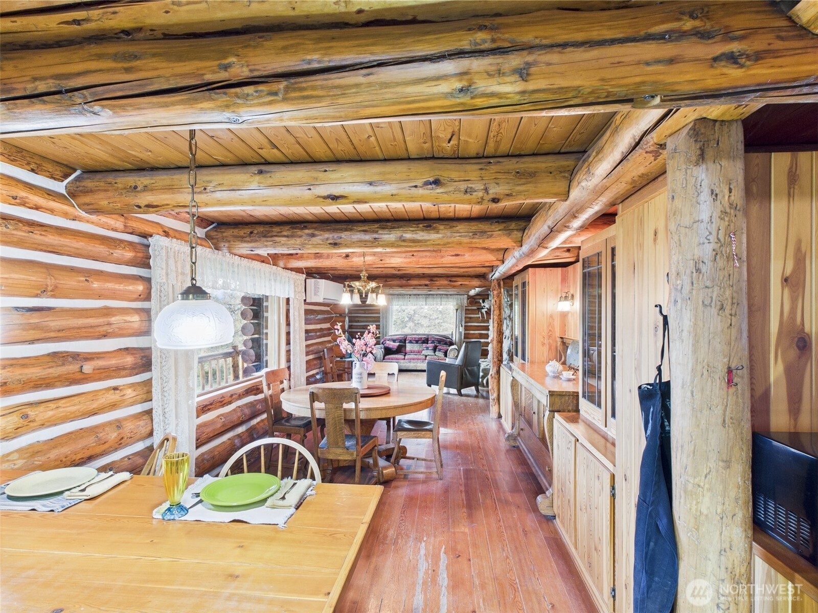 98 Tall Timber Lane Republic, WA 99166 - Photo 6 of 30 a view of a hallway with wooden floor and furniture