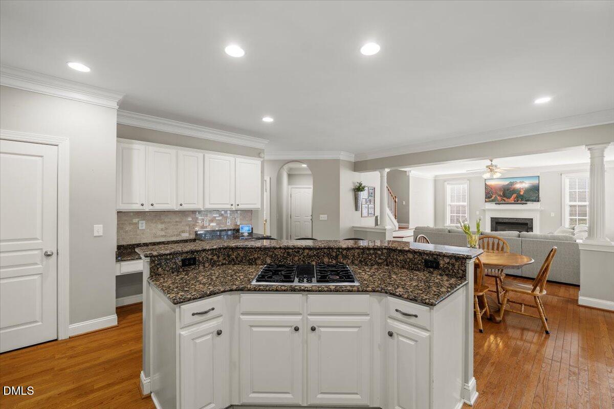 7828 Percussion Drive Apex, NC 27539 - Photo 24 of 88 a kitchen with a counter space a sink and cabinets