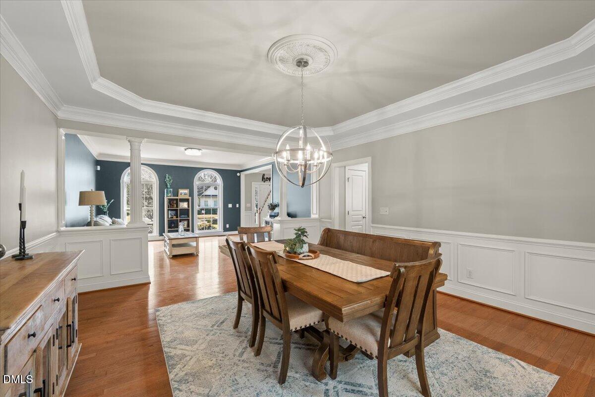 7828 Percussion Drive Apex, NC 27539 - Photo 36 of 88 a view of a dining room with furniture and window