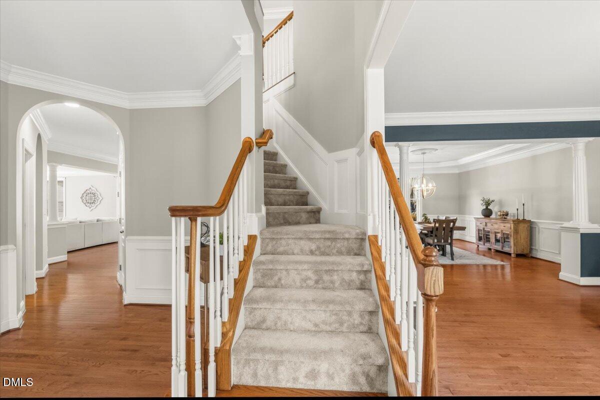 7828 Percussion Drive Apex, NC 27539 - Photo 41 of 88 a view of entryway and hall with wooden floor