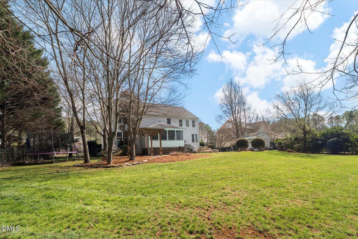 7828 Percussion Drive Apex, NC 27539 - Photo 78 of 88 a view of a house with a yard