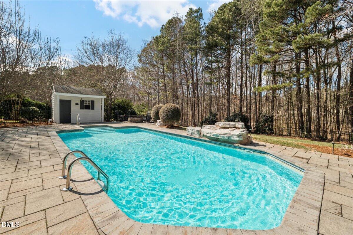7828 Percussion Drive Apex, NC 27539 - Photo 8 of 88 a view of a house with backyard