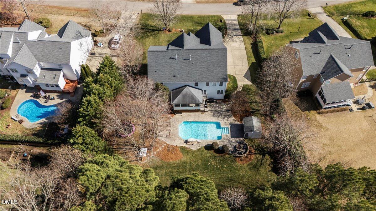 7828 Percussion Drive Apex, NC 27539 - Photo 86 of 88 an aerial view of house with yard swimming pool and outdoor seating