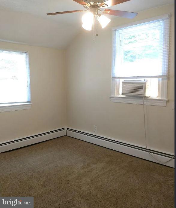 6545 Grays Mill Road, Unit 3 Warrenton, VA 20187 - Photo 6 of 8 an empty room with a window