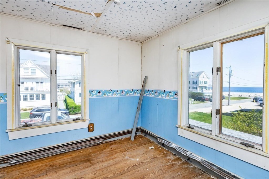 88 Marion Road Scituate, MA 02066 - Photo 14 of 41 a view of an empty room with a window