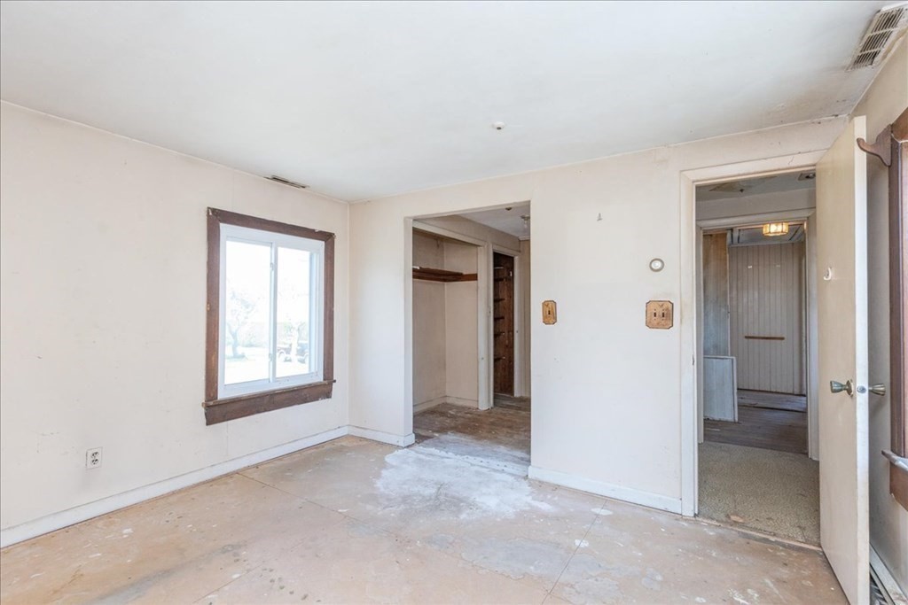 88 Marion Road Scituate, MA 02066 - Photo 16 of 41 an empty room with windows and a bathroom