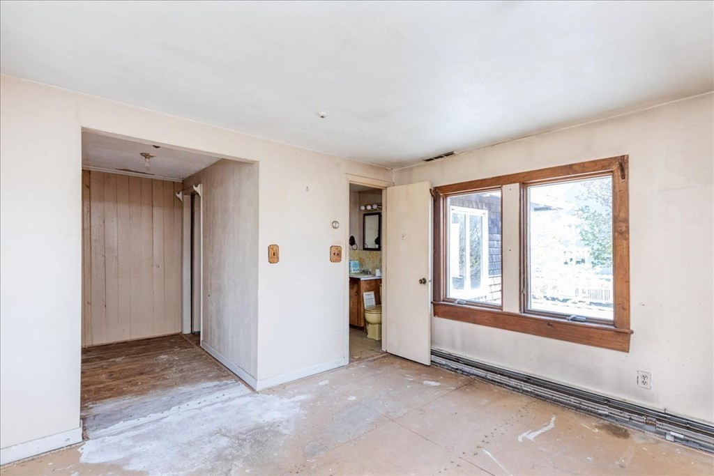 88 Marion Road Scituate, MA 02066 - Photo 17 of 41 a view of an empty room with a window