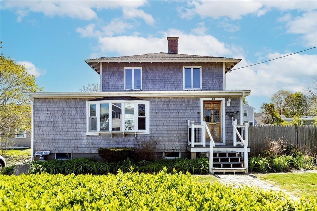 88 Marion Road Scituate, MA 02066 - Photo 2 of 41 a front view of a house with garden