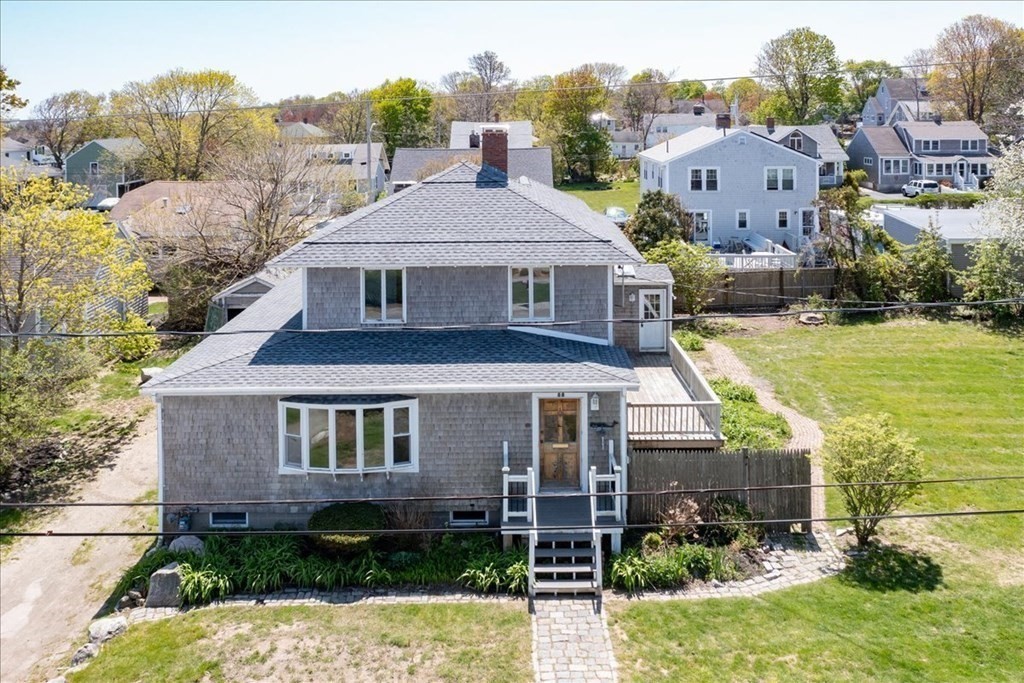 88 Marion Road Scituate, MA 02066 - Photo 36 of 41 a aerial view of a house next to a yard