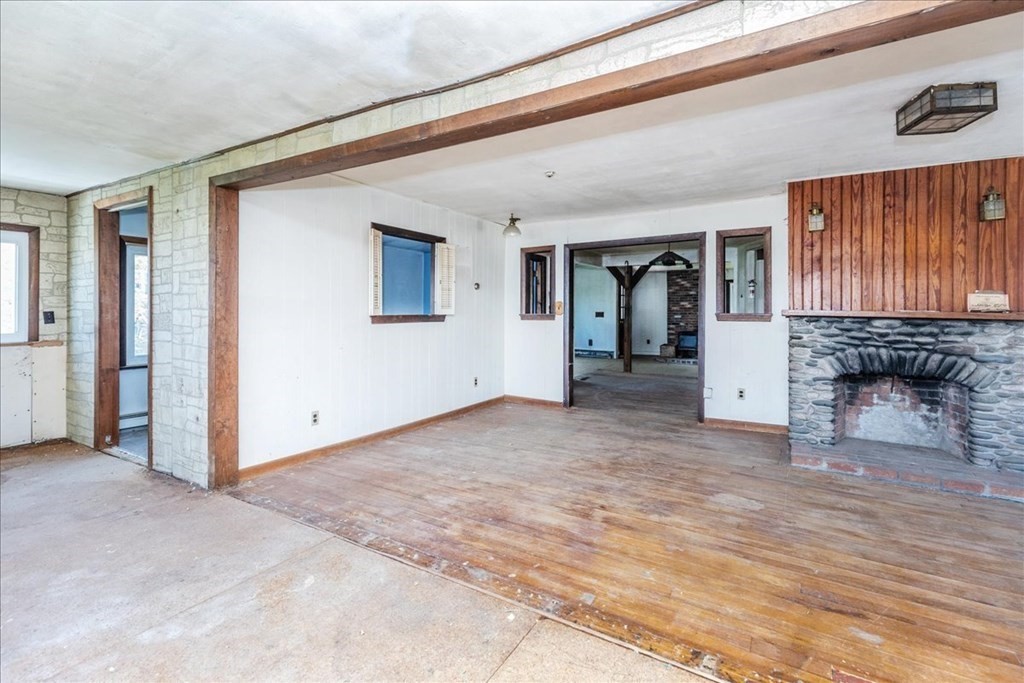 88 Marion Road Scituate, MA 02066 - Photo 6 of 41 a view of a livingroom with a staircase