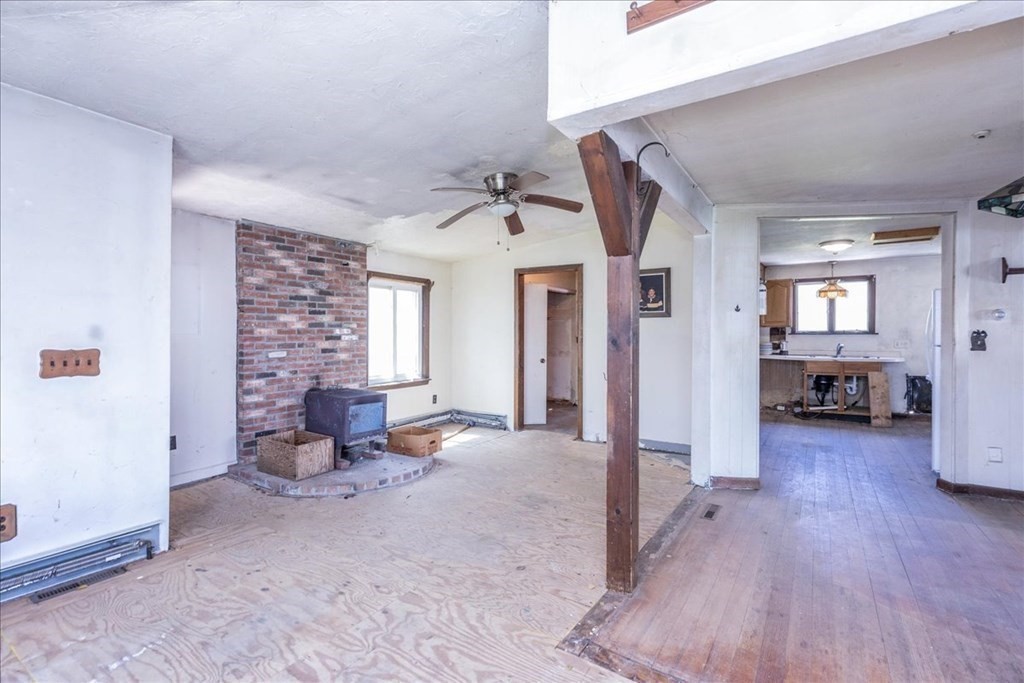 88 Marion Road Scituate, MA 02066 - Photo 9 of 41 a living room with furniture and a wooden floor