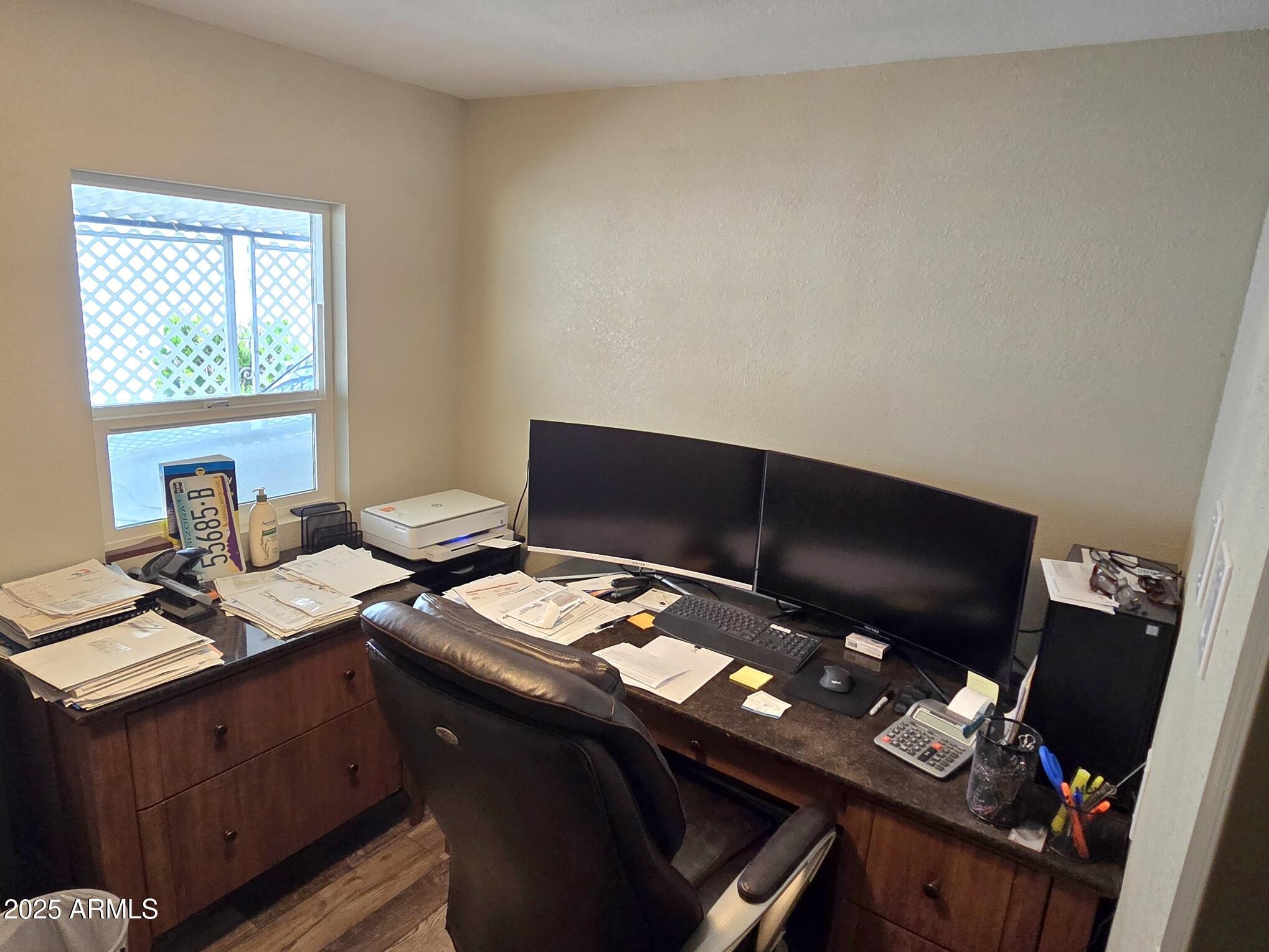 2900 West Superstition Boulevard, Unit 46 Apache Junction, AZ 85120 - Photo 14 of 26 a desktop computer sitting on top of a desk