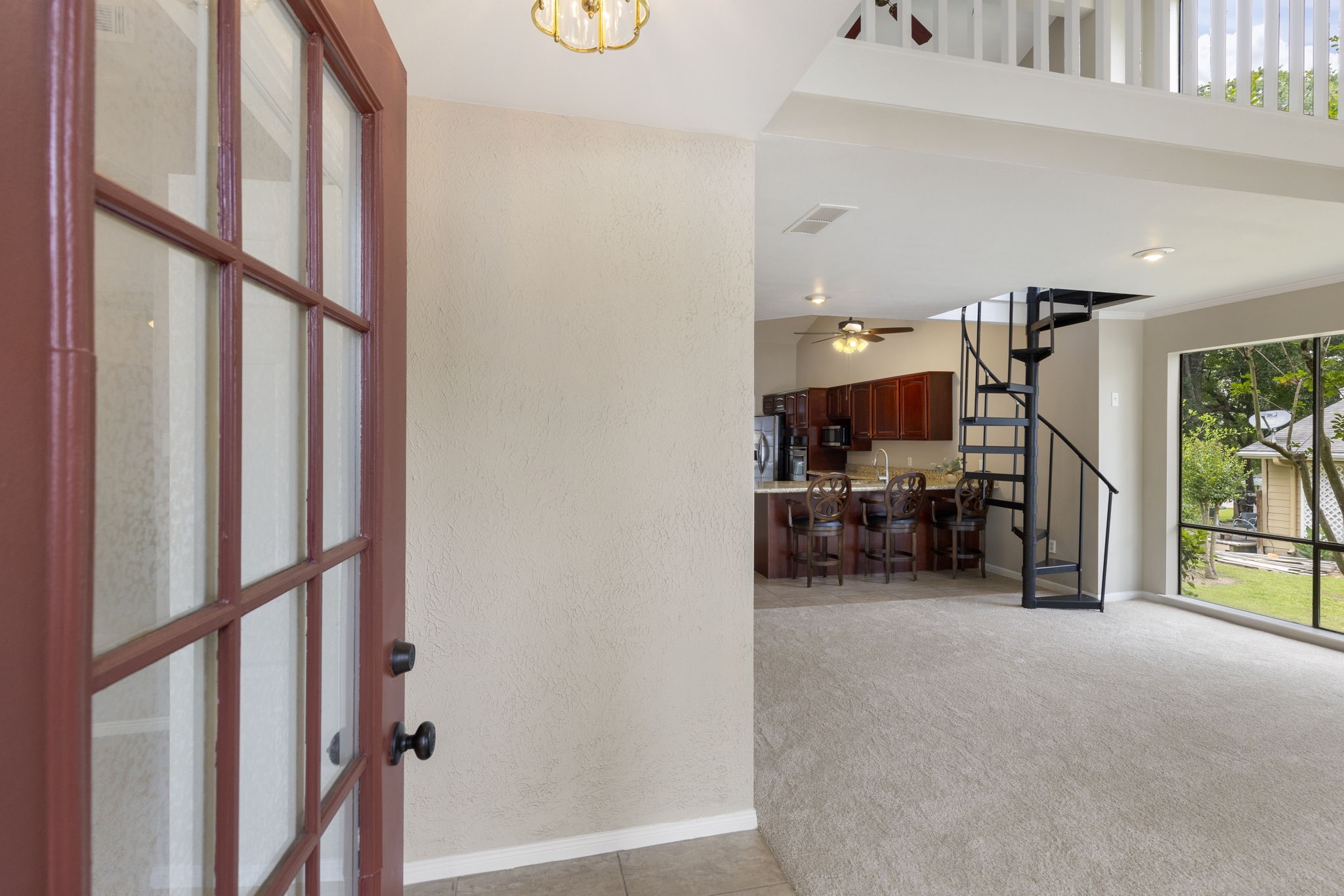 49 April Village Conroe, TX 77356 - Photo 5 of 46 a view of a livingroom with furniture and a hallway