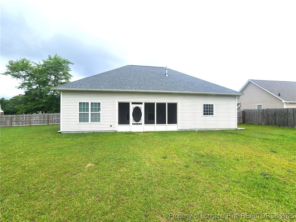 265 Carolina Oaks Circle Linden, NC 28356 - Photo 13 of 31 a view of a house with a backyard