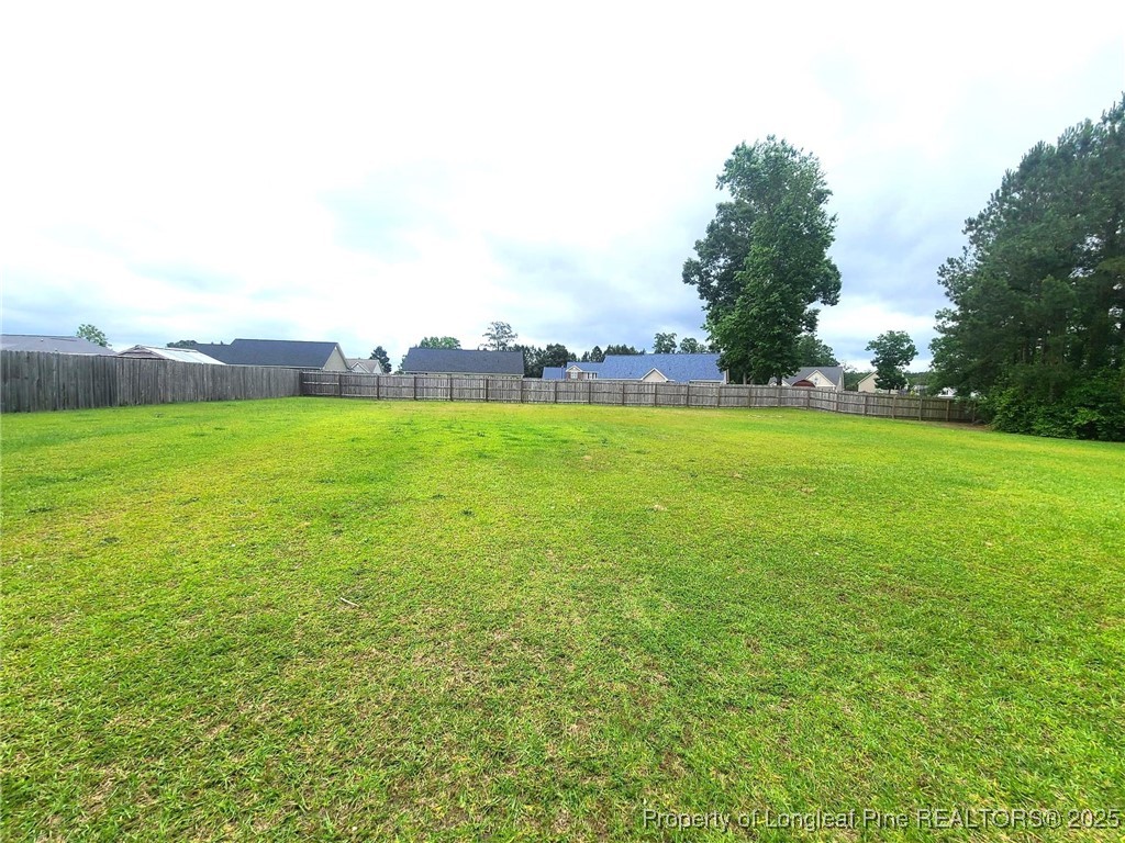 265 Carolina Oaks Circle Linden, NC 28356 - Photo 15 of 31 a view of a field with an ocean