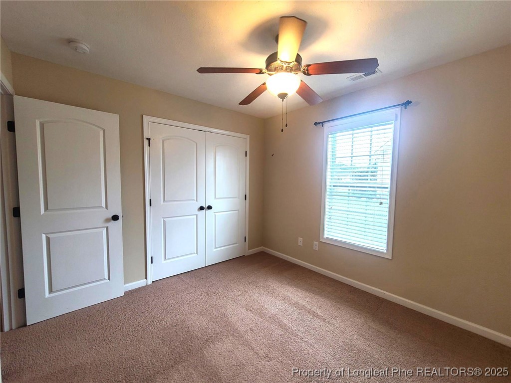 265 Carolina Oaks Circle Linden, NC 28356 - Photo 25 of 31 a view of an empty room with a window