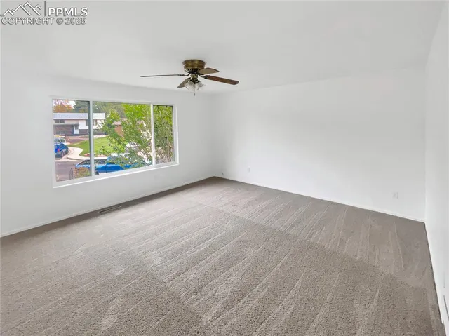 a view of a room with a window